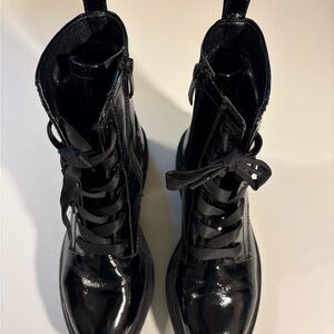 Tamari’s brand black combat boots
